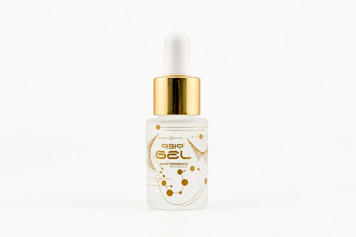 QBio Gel in a frosted glass dropper bottle with a gold collar.